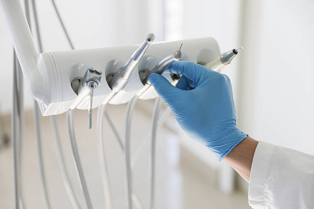 Professional Tooth Extraction technician working in Williamsburg, VA